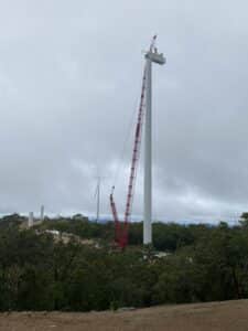 A Liebherr LG1750 crane owned by Mammoet works on a wind turbine with a hub height of 149 metres in rural Queensland.