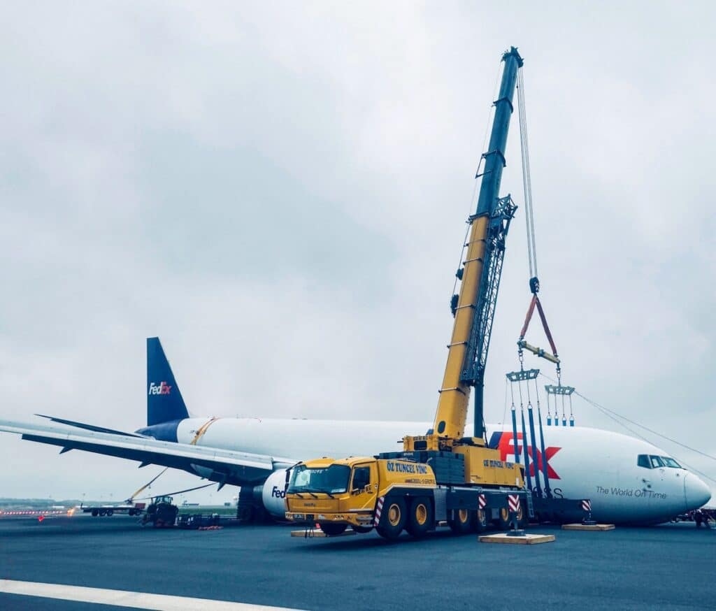 A 300-tonne crane, the Grove GMK6300L-1, salvages a Boeing 767 at the Istanbul Airport.